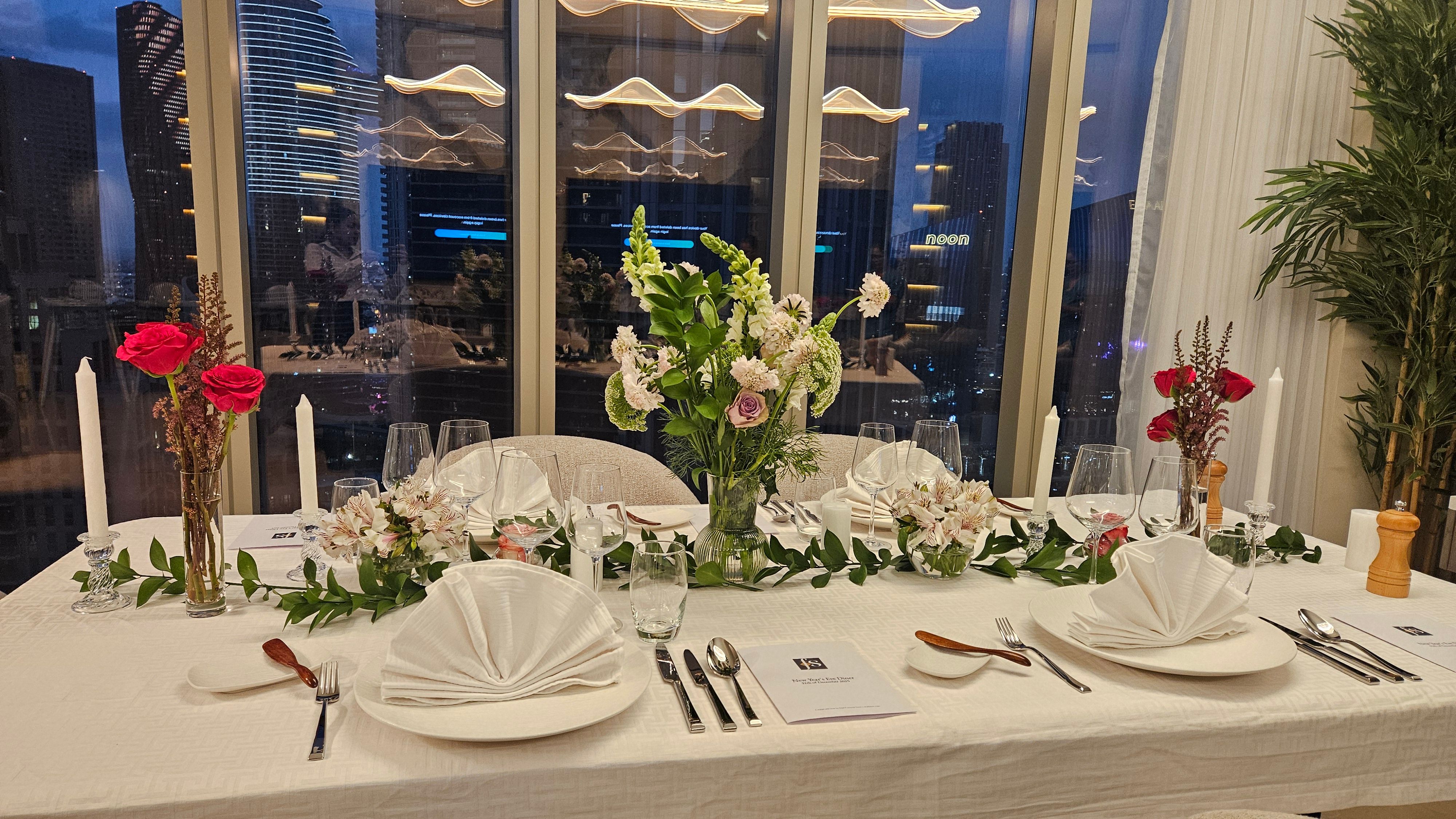 Festive table against the DIFC skyline.