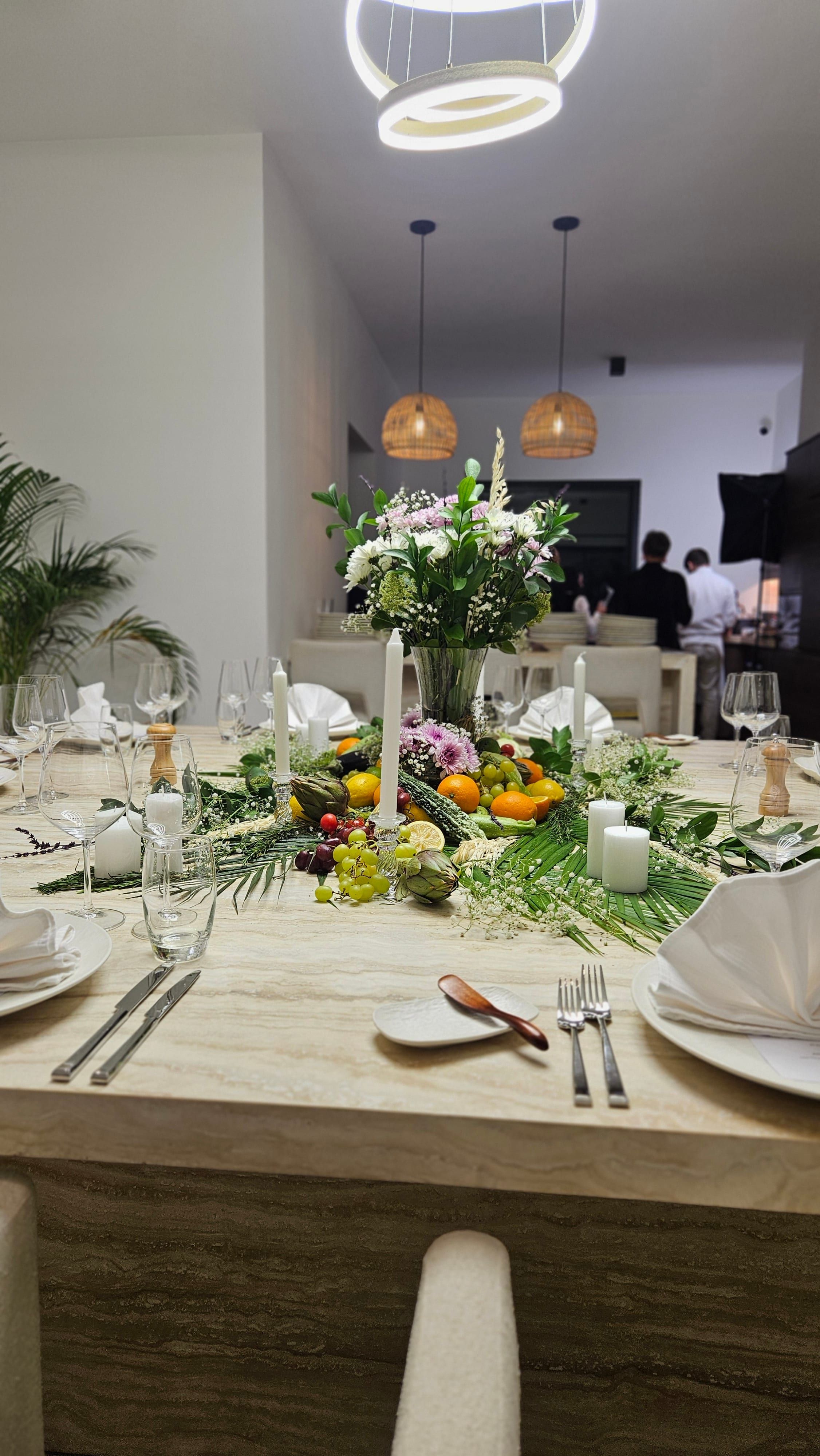 A dressed dining table in a modern Abu Dhabi residence.