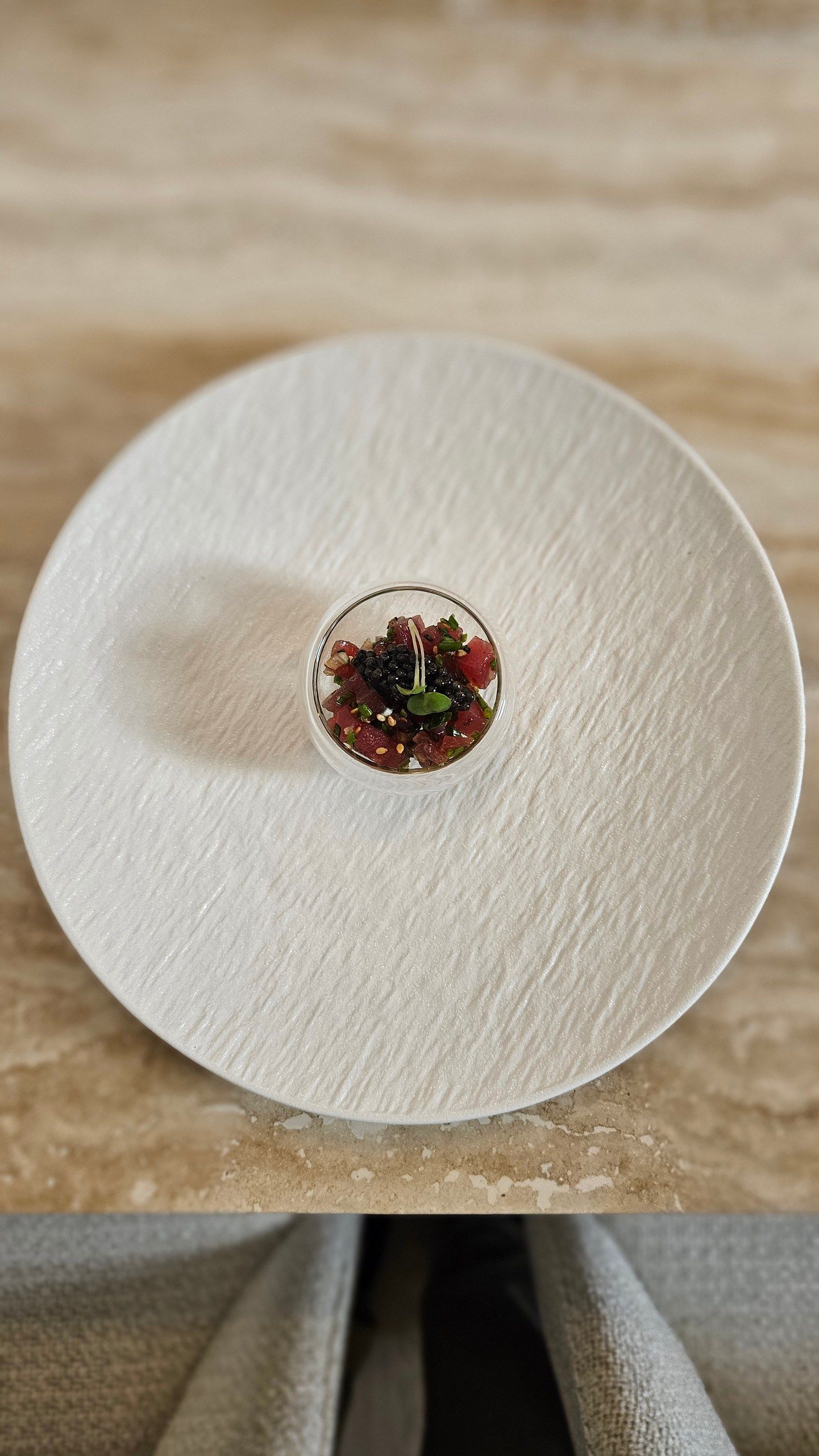 A tartare topped with caviar, plated as a New Year's Eve starter