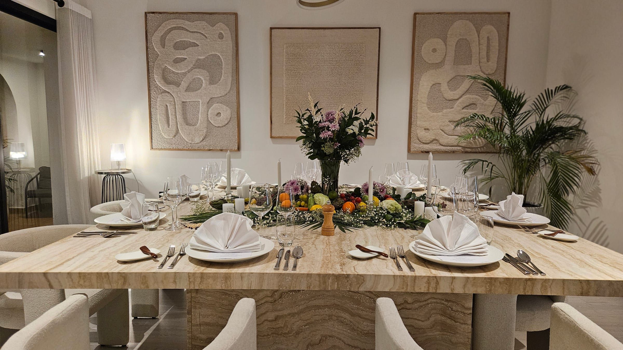 A dressed table set for dinner in a Palm Jumeirah villa.