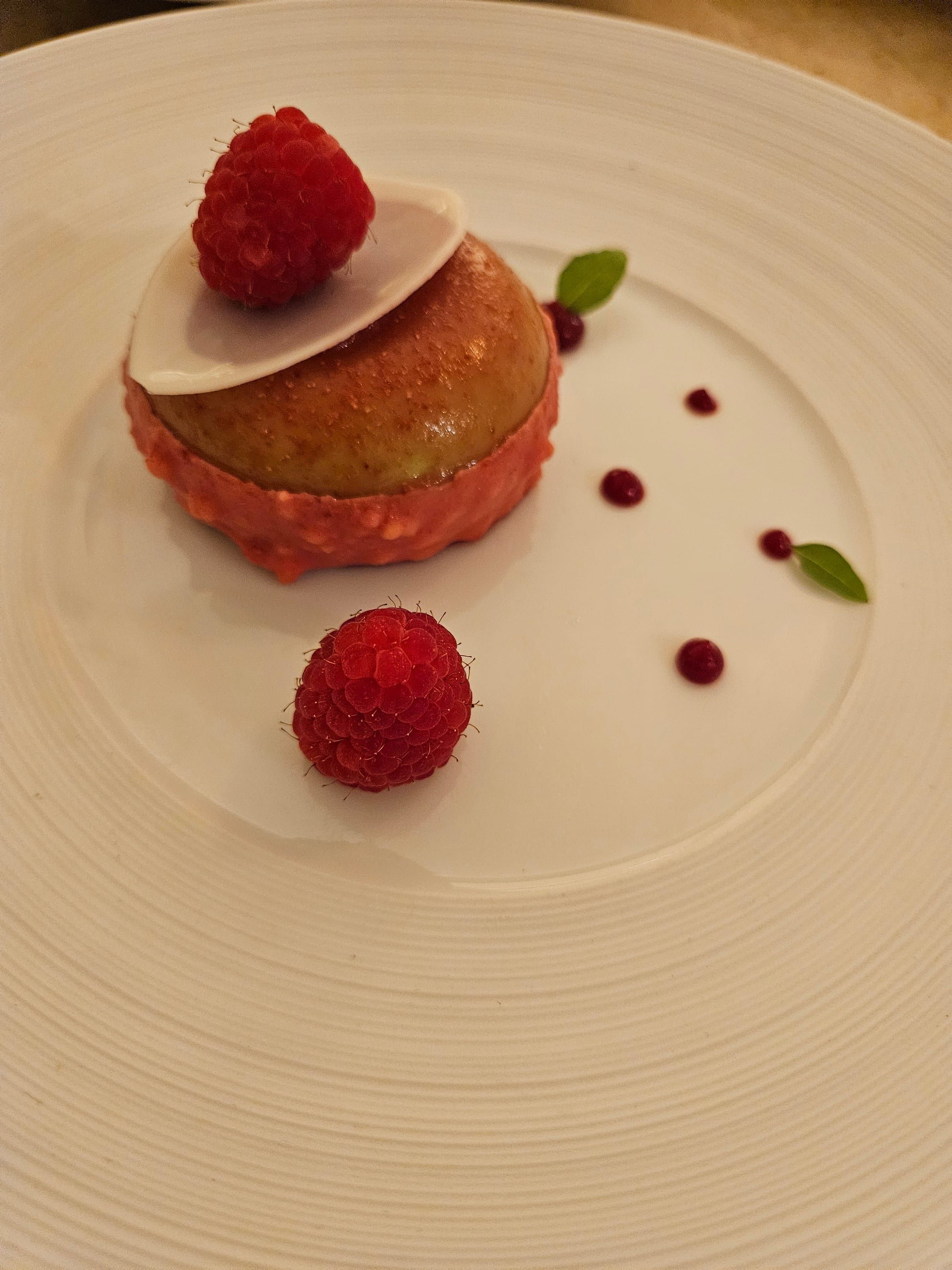 Wedding dessert with raspberry.
